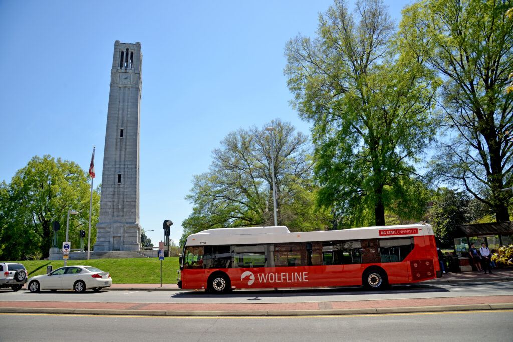 Wolfline bus at Hillsborough Street stop by the Memorial Belltower.